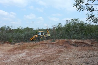 Aviram with JCB water conservation work in the forest