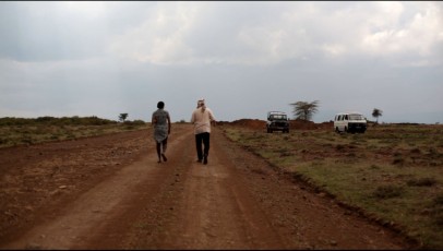 Brooke and Aviram survying the land on road next to Sadhana Forest Kenya