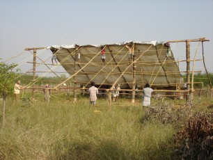 Constructing first dormitory (2)