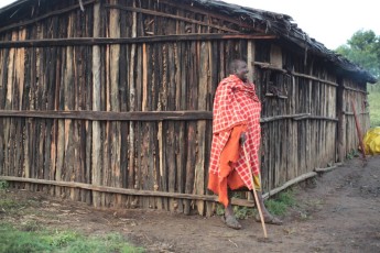 Samburu man outside his house