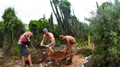 Volunteers creating permaculture sponge