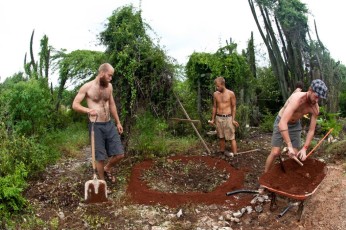 Volunteers creating permaculture sponge (2)