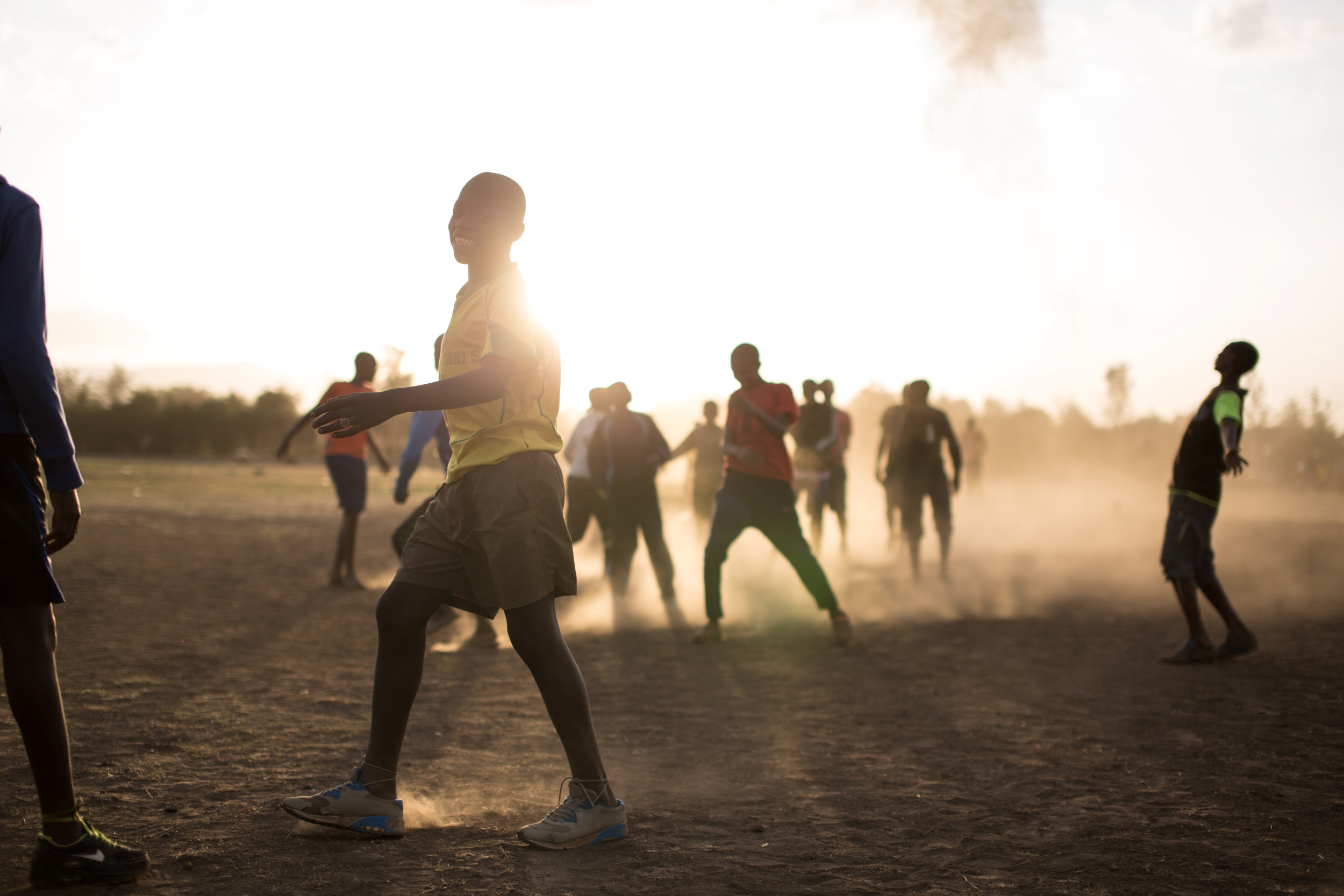 Samburu boys playing on a dusty field
